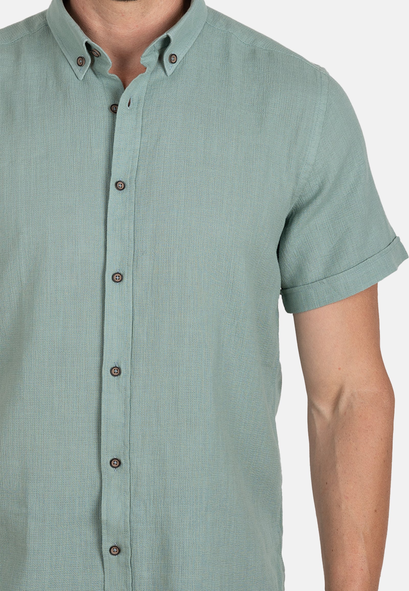 Camisa verde de algodón rústico manga corta con cuello abotonado
