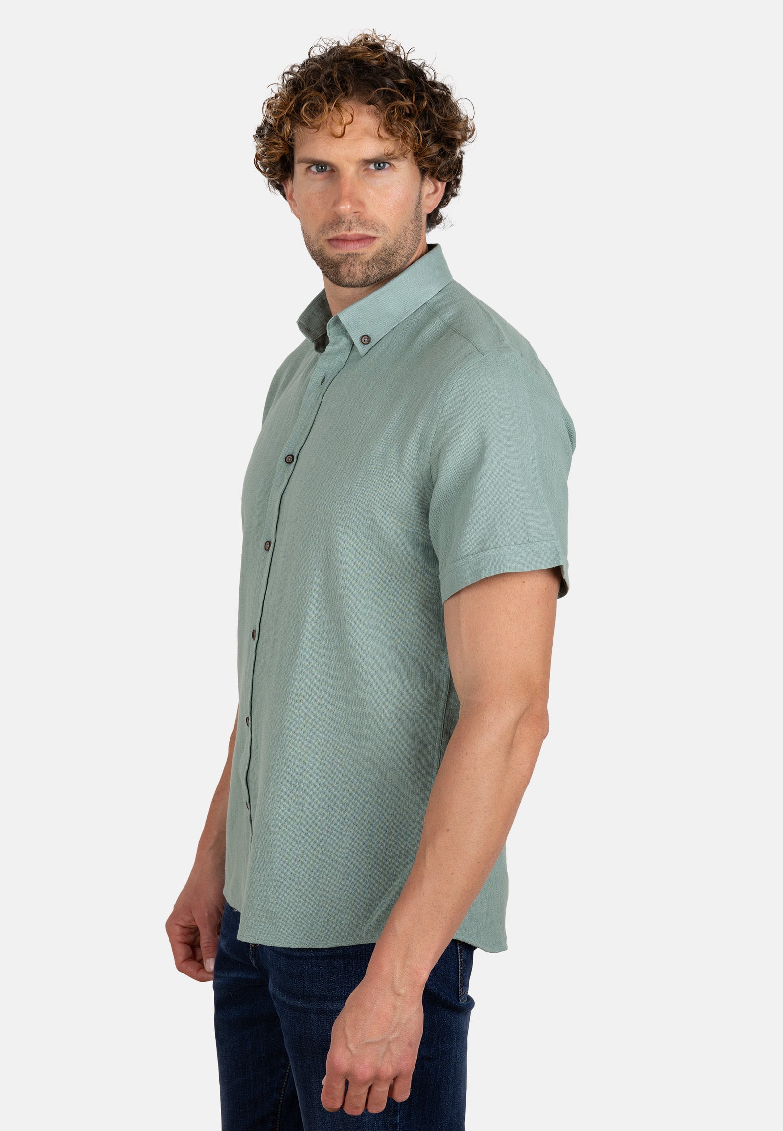 Camisa verde de algodón rústico manga corta con cuello abotonado