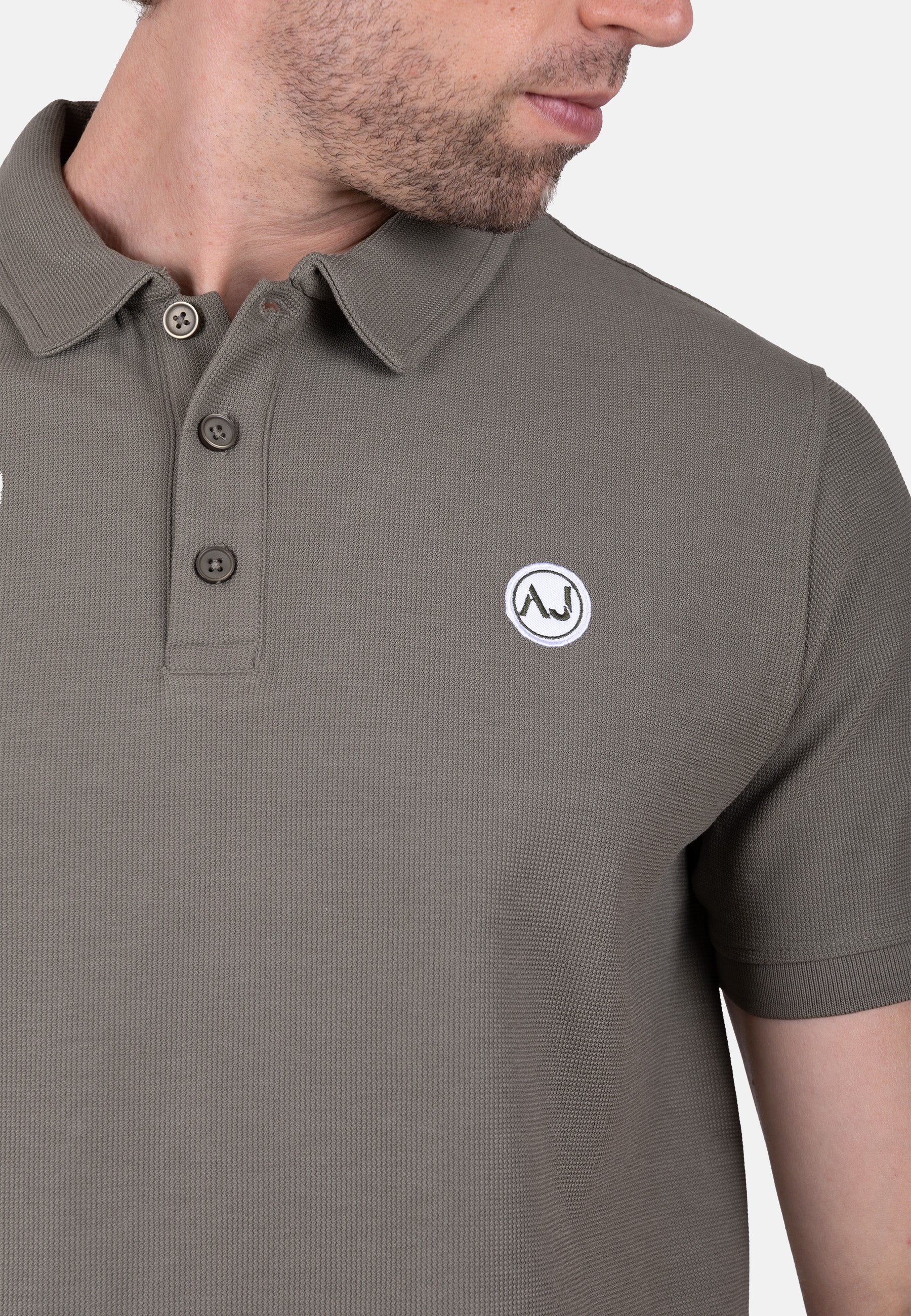 Polo piqué verde con bordado logo amaro